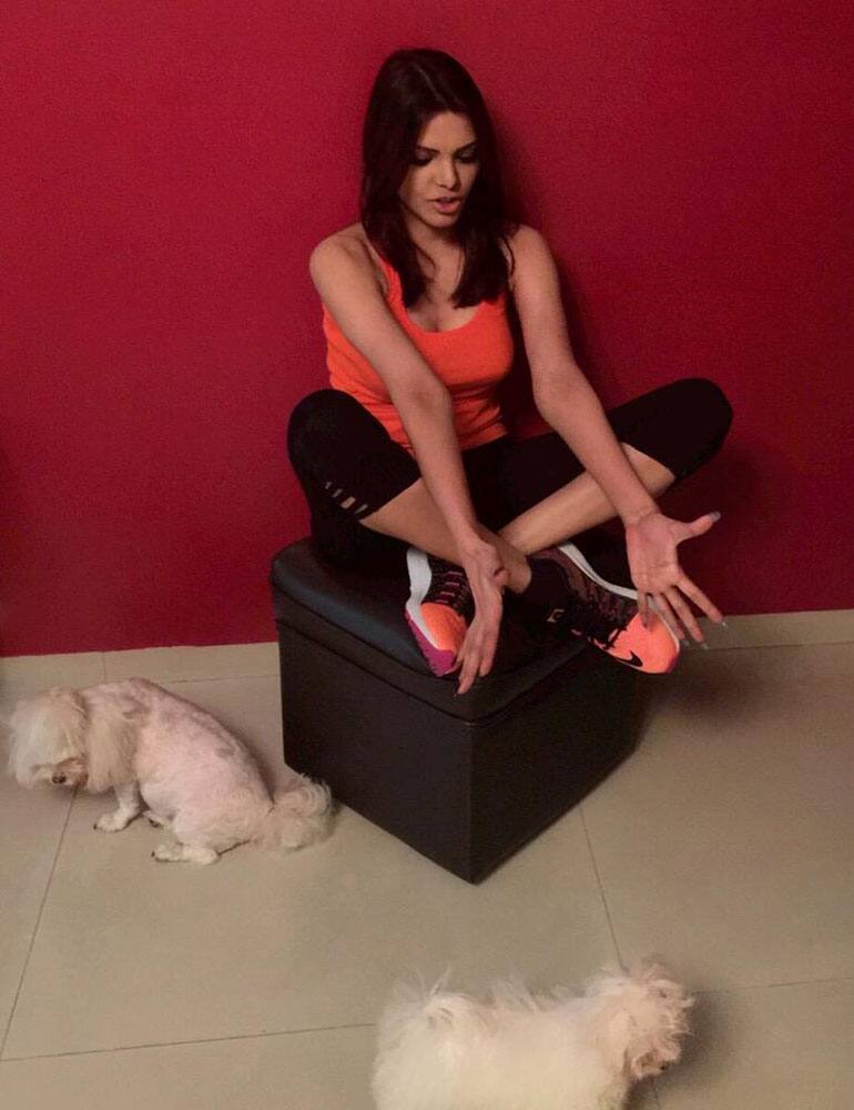 SHERLYN CHOPRA :- Done with d morning routine..Time now for some puppy + jhappi  Have a great day y'all! ❤ -twitter