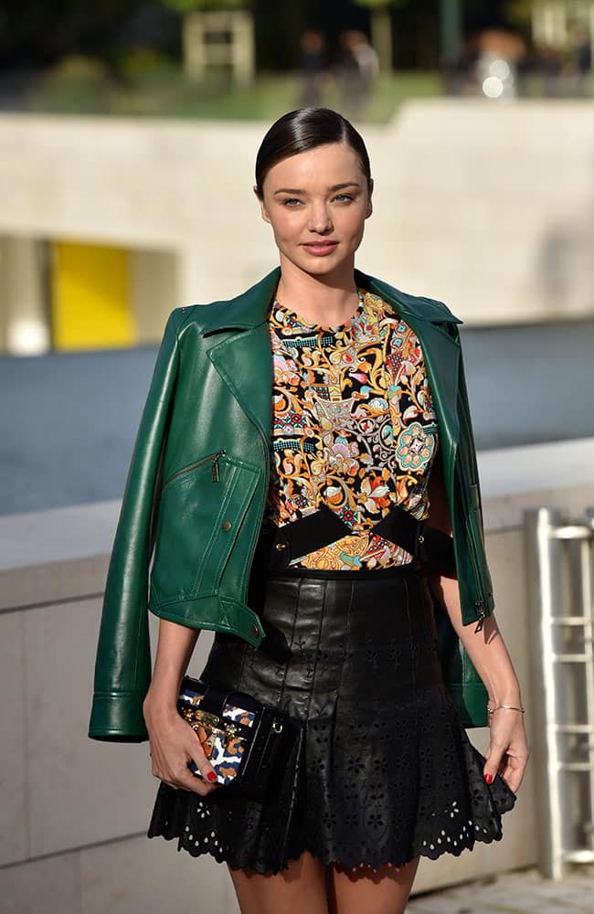 Australian model Miranda Kerr poses as she arrives at Louis Vuitton's Spring-Summer 2016 ready-to-wear fashion collection during the Paris Fashion Week.