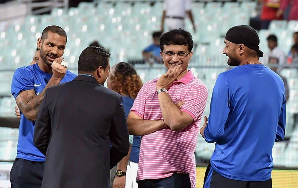 Sourav Ganguly, Shikhar Dhawan and Harbhajan Singh before the start of T20 match at Eden Garden in Kolkata