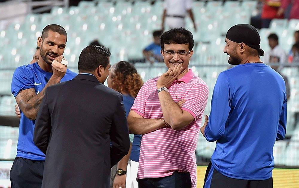 Sourav Ganguly, Shikhar Dhawan and Harbhajan Singh before the start of T20 match at Eden Garden in Kolkata.