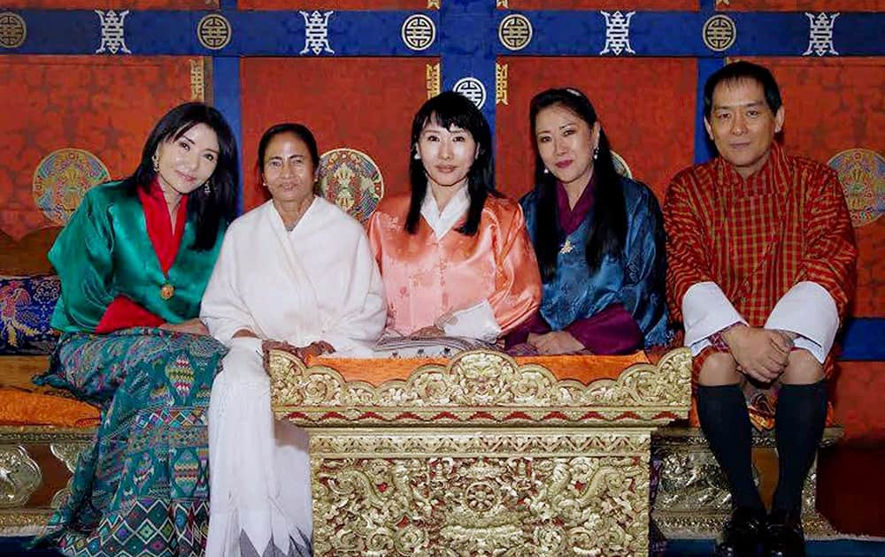 West Bengal Chief Minister Mamata Banerjee poses for a photograph with members of Bhutan Royal family during a visit to Bhutan.