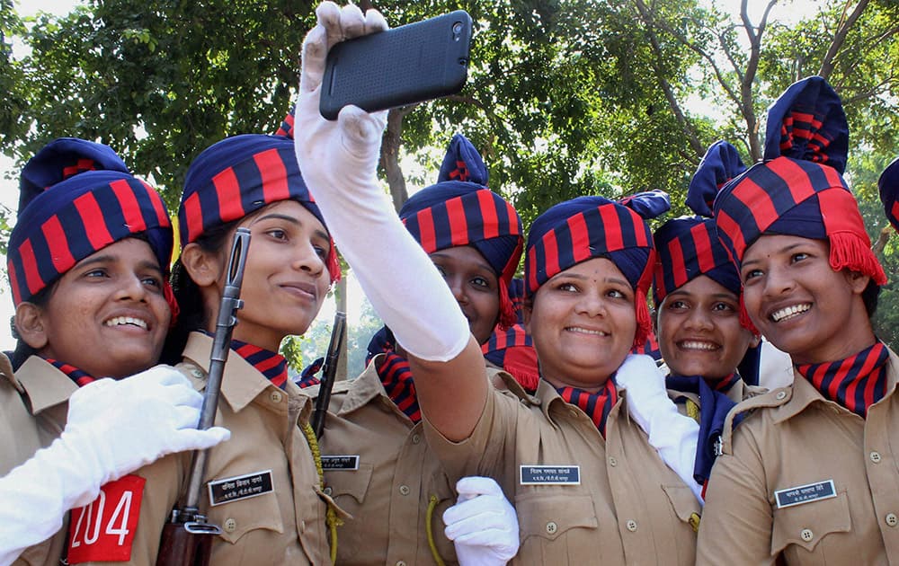 Women constables take selfie after their passing out parade at Police Training Center in Nagpur.