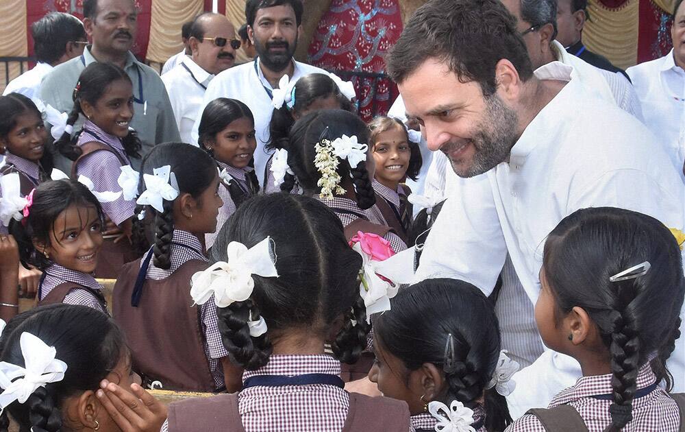 Congress Vice-President Rahul Gandhi interacts students at Maidur higher primary school during his padayatra from Maidur village in Haveri district of north Karnataka.