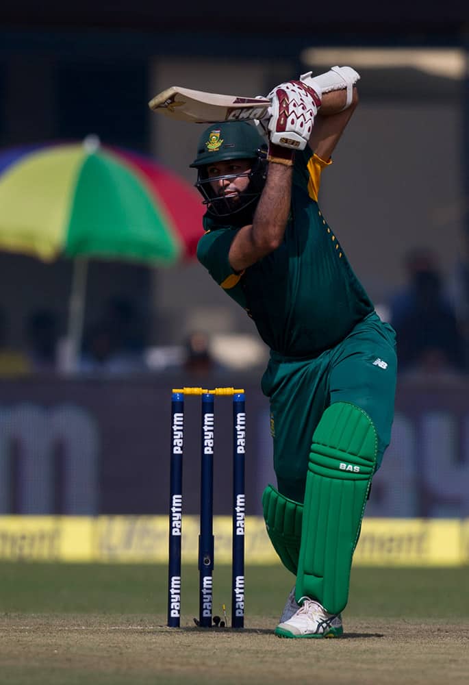 South African batsman Hashim Amla plays a shot while playing against India in the first of their five one-day match series in Kanpur, India.