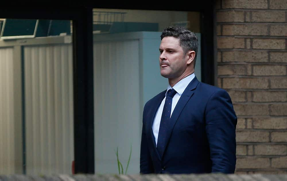 Former New Zealand cricketer Chris Cairns arrives at Southwark Crown Court to stand trial for perjury in London.