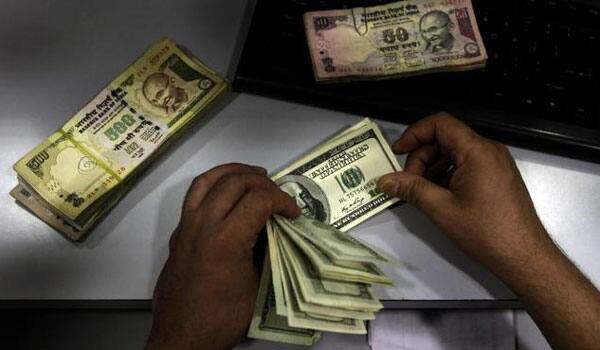 Rupee falls past 65-mark, plunges 43 paise