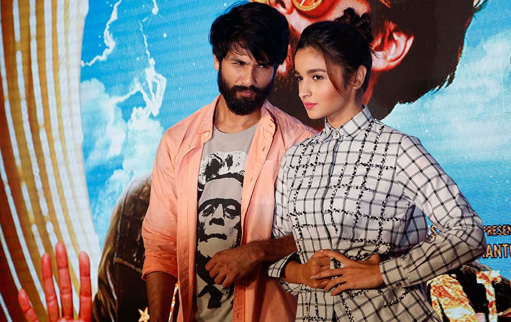 Shahid Kapoor and Alia Bhatt pose for photographs during the song launch of their movie “Shaandaar” in Mumbai.