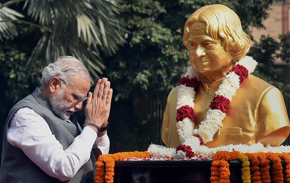 Prime Minister, Narendra Modi pay tributes to former President A P J Abdul Kalam, on his 84th birth anniversary, at DRDO Bhawan in New Delhi.