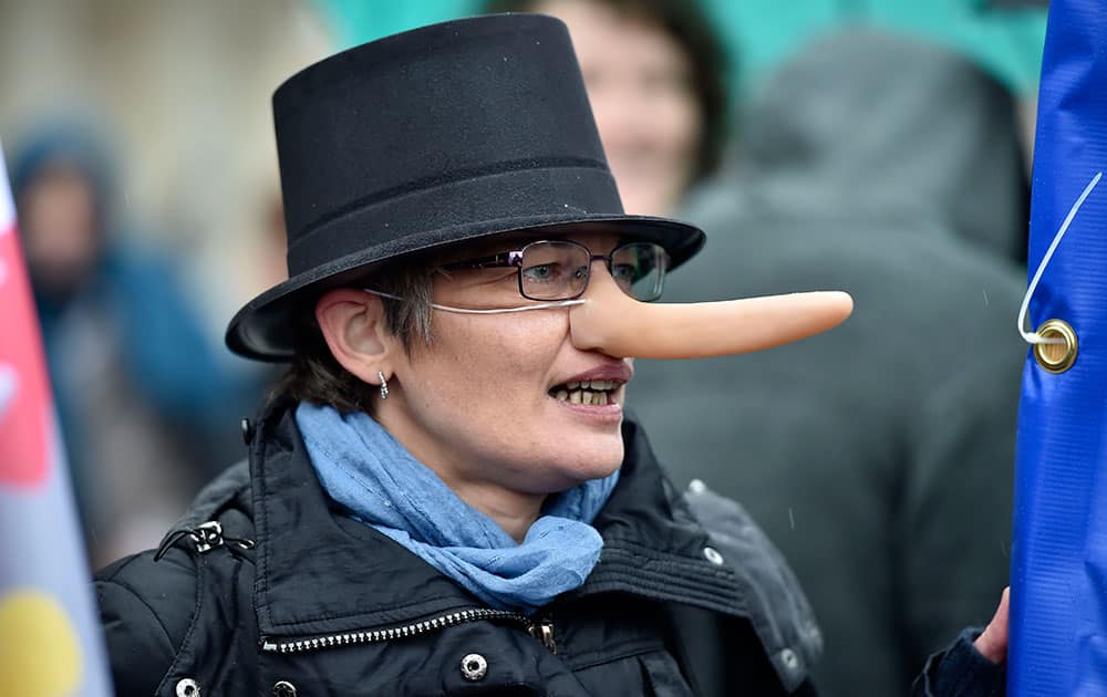 Protestors demonstrate during an EU summit in Brussels, Belgium.