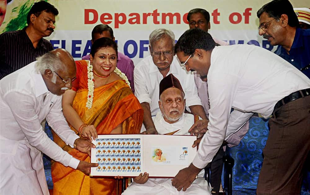 Mohammed Muthu Meera Lebbai Maraicker, elder brother of former President APJ Abdul Kalam, J Charukeshi, Postmaster General, Southern Region and Ramanathapuram district collector during the release of commemorative ctamp to mark 84th birth celebration of A P J Abdul Kalam, in Rameswaram.