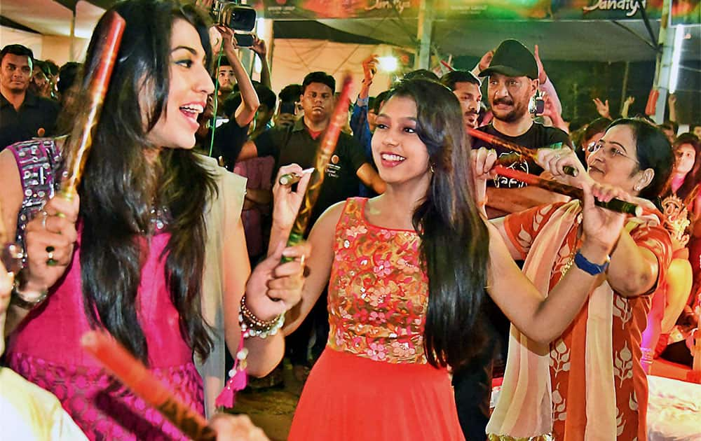 Actress Niti Taylor (red dress) performs Graba during Dandiya utsav organized ahead of Navratra festival in Nagpur.