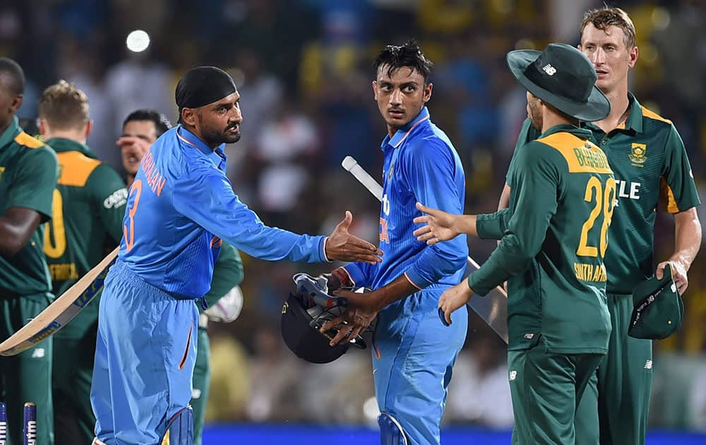 South African players celebrate thier victroy against India during a one day match in Rajkot.