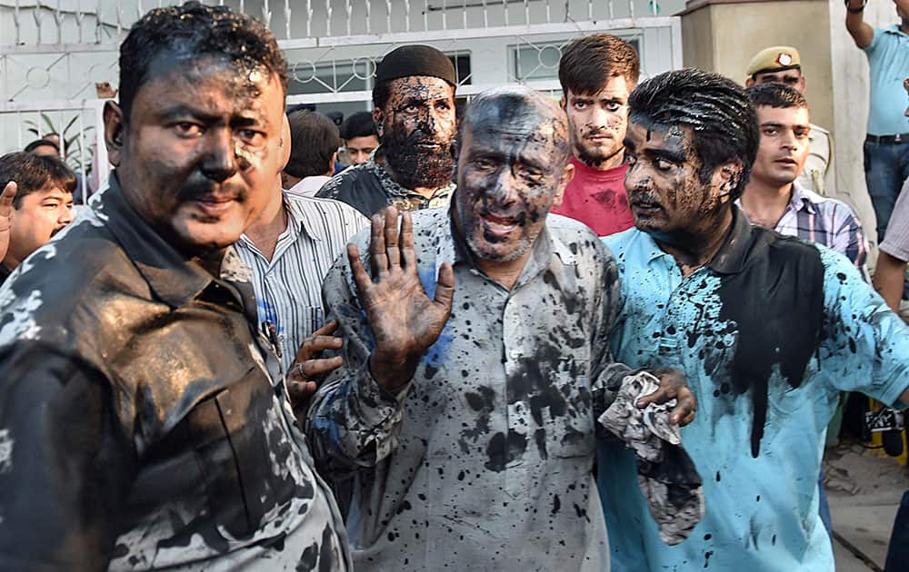 Jammu and Kashmir MLA Abdul Rashid Sheikhs face was blackened by few activists, allegedly belonging to a right-wing organisation, at Press Club in New Delhi.