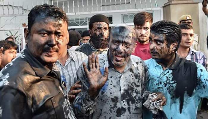 Beef party: J&amp;K MLA Engineer Rashid&#039;s face painted black, two arrested 
