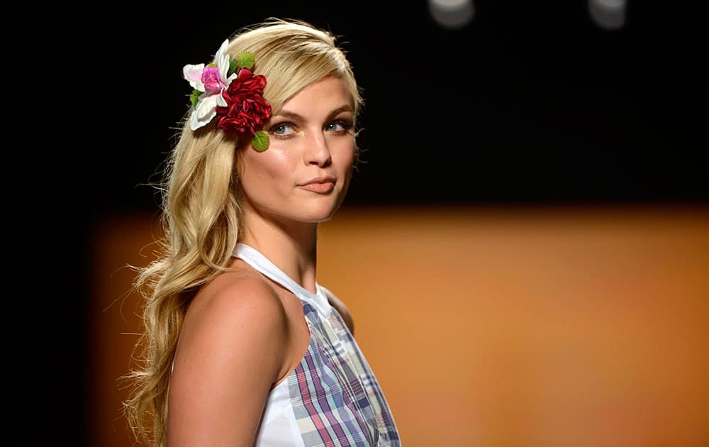 A model walks the runway in the Preloved show, part of Fashion Week in Toronto.