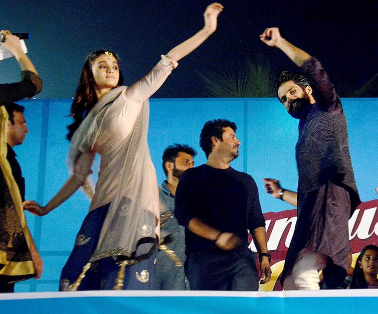 Shahid Kapoor and Alia Bhatt play Garba during Navratri festival in Ahmedabad.