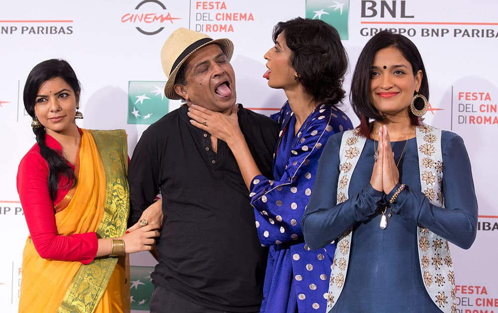 From left, actresses Rajshri Deshpande, director Pan Nalin, and actresses Anushka Manchanda and Sandhya Mridul pose for photographers during the photo call of the movie Angry Indian Goddesses at the Rome Film Festival in Rome.