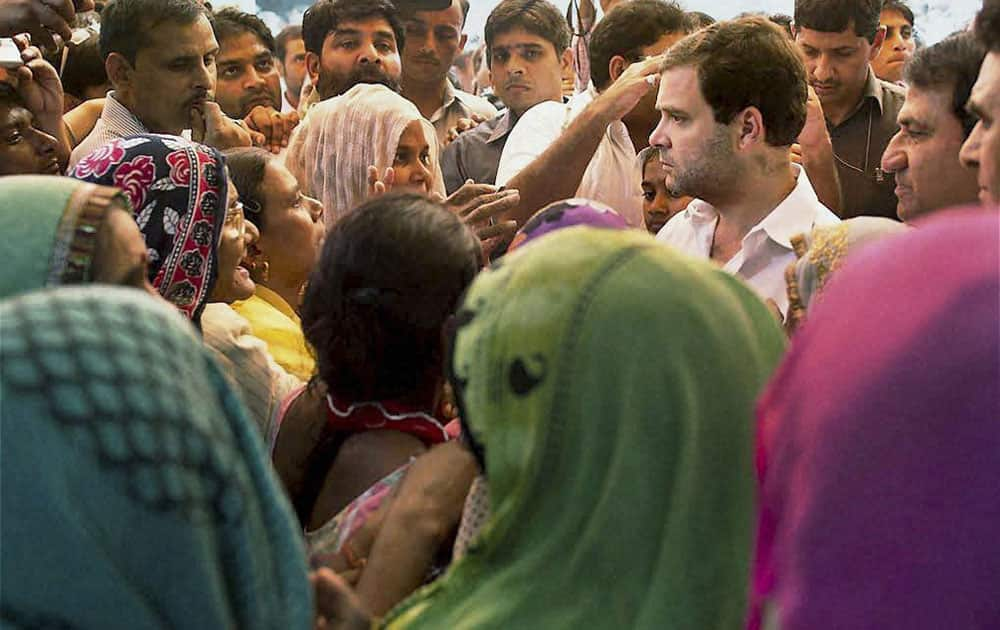 Congress Vice President Rahul Gandhi meeting people at Sunpedh village where a dalits house was set on fire allegedly by men belonging to the upper-caste community, in Ballabhgarh in Faridabad.