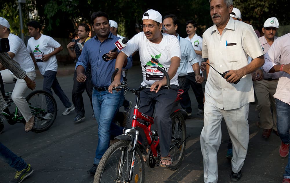 Delhi Chief Minister Arvind Kejriwal, takes part in a cycle rally during a car-free day covered only a six-kilometer (4-mile) stretch in New Delhi.