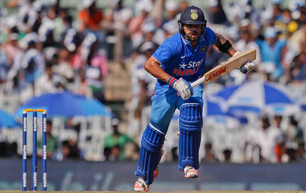 Virat Kohli, scores a run during their fourth one-day international cricket match against South Africa in Chennai.