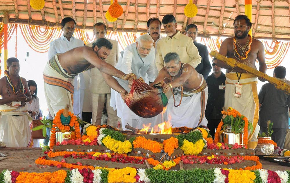 Prime Minister Narendra Modi performing the Pooja rituals at the foundation stone laying ceremony of Amaravathi- the new capital of Andhra Pradesh.