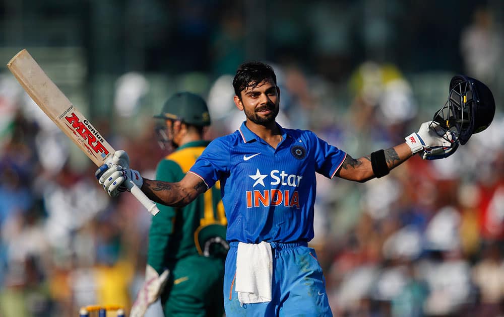 Virat Kohli, celebrates his hundred runs during their fourth one-day international cricket match against South Africa in Chennai.