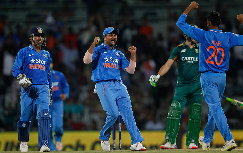 Indians celebrate the dismissal of South Africa's Faf du Plessis, during their fourth one-day international cricket match in Chennai.