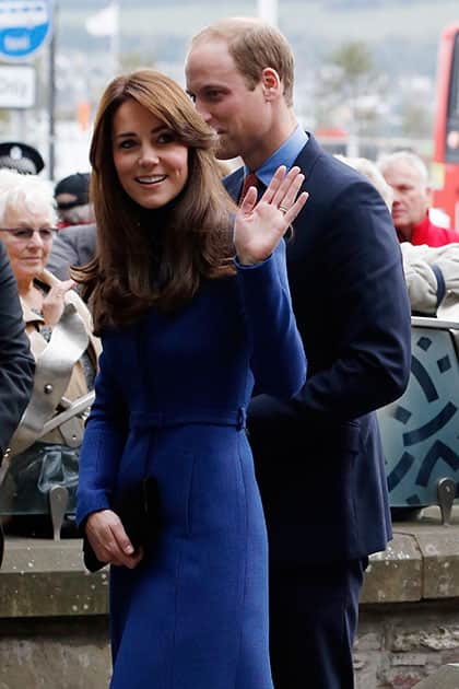 Britain's Prince William and Kate, the Duchess of Cambridge arrive for a visit to 'The Corner', where they participated in an anti-bullying workshop as part of their visit to Dundee, Scotland.