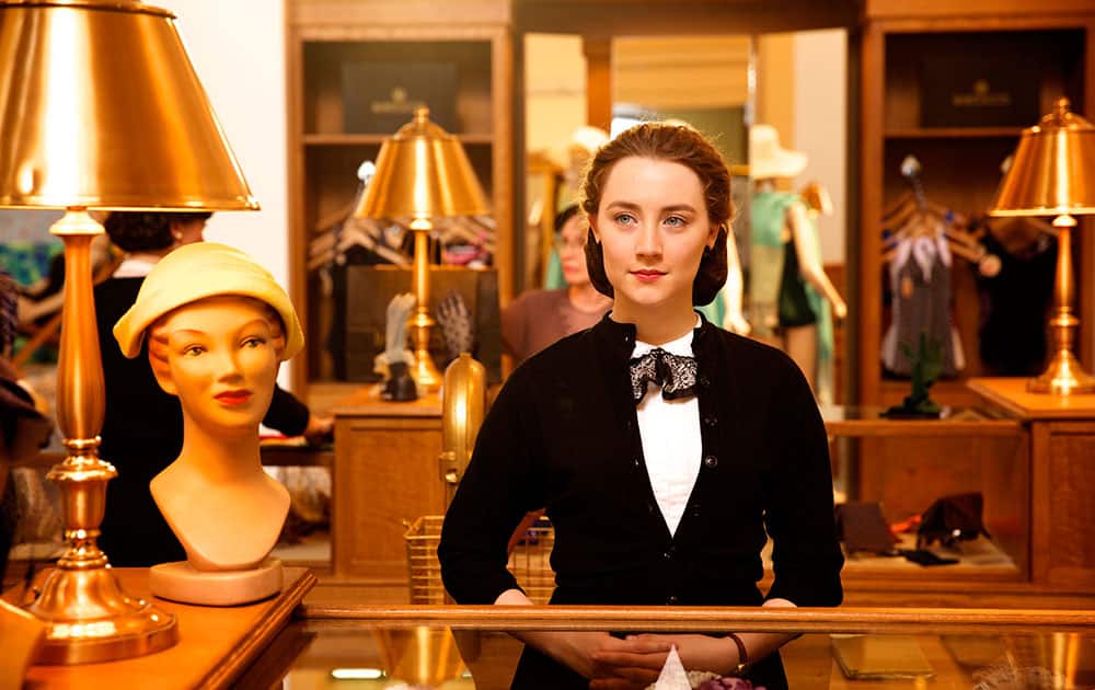 This photo provided by Fox Searchlight shows, Saoirse Ronan as Eilis in a scene from the film, 'Brooklyn.' The movie opens in US theaters.