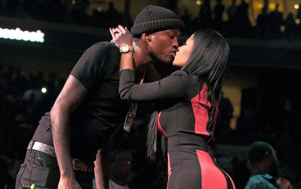 Meek Mill and Nicki Minaj kiss after their performance at the Power 99 POWERHOUSE 2015 at the Wells Fargo Center in Philadelphia.