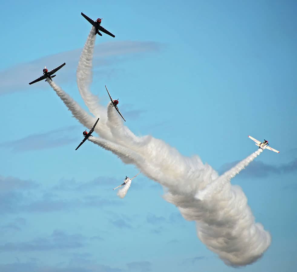 The GEICO Skytypers Airshow Team breaks formation in their six vintage WWII era U.S. Navy SNJ-2 trainers during the 2015 Jacksonville Sea & Sky Spectacular air show at Jacksonville Beach, Fla.