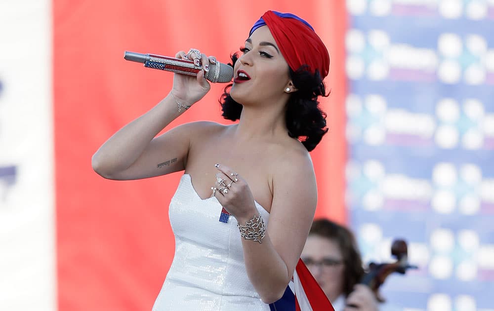 Singer Katy Perry performs during a rally for Democratic presidential candidate Hillary Rodham Clinton before the Iowa Democratic Party's Jefferson-Jackson Dinner in Des Moines, Iowa.