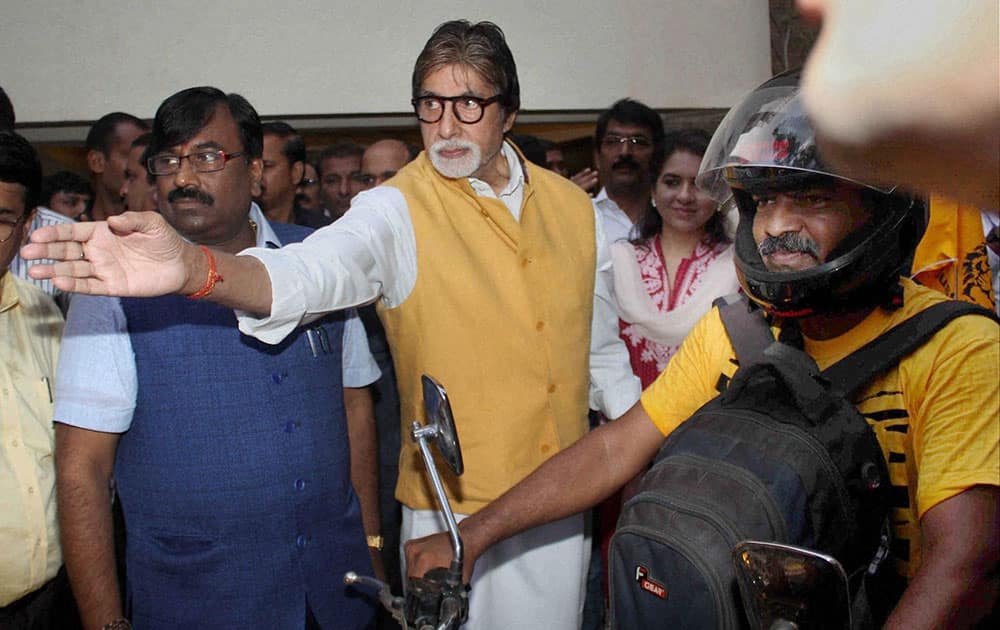 Bollywood actor Amitabh Bachchan and Sudhir Mungantiwar, Maharashtra minister of Finance and Planning, Forest Department during the flag off of Tiger Conservation Bike Rally, in Mumbai.