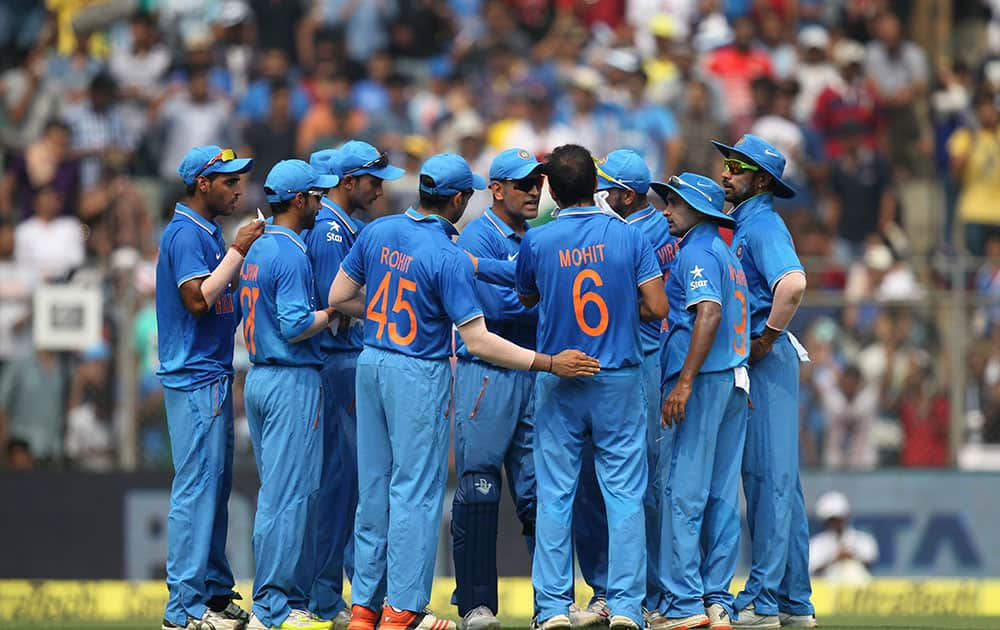 Indian players celebrate the dismissal of South Africa’s Hashim Amla during the final one-day international cricket match of a five-game series in Mumbai, India.