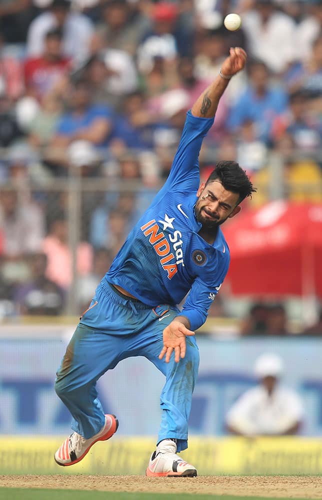 India's Virat Kohli bowls during the final one-day international cricket match of a five-game series against South Africa in Mumbai, India.