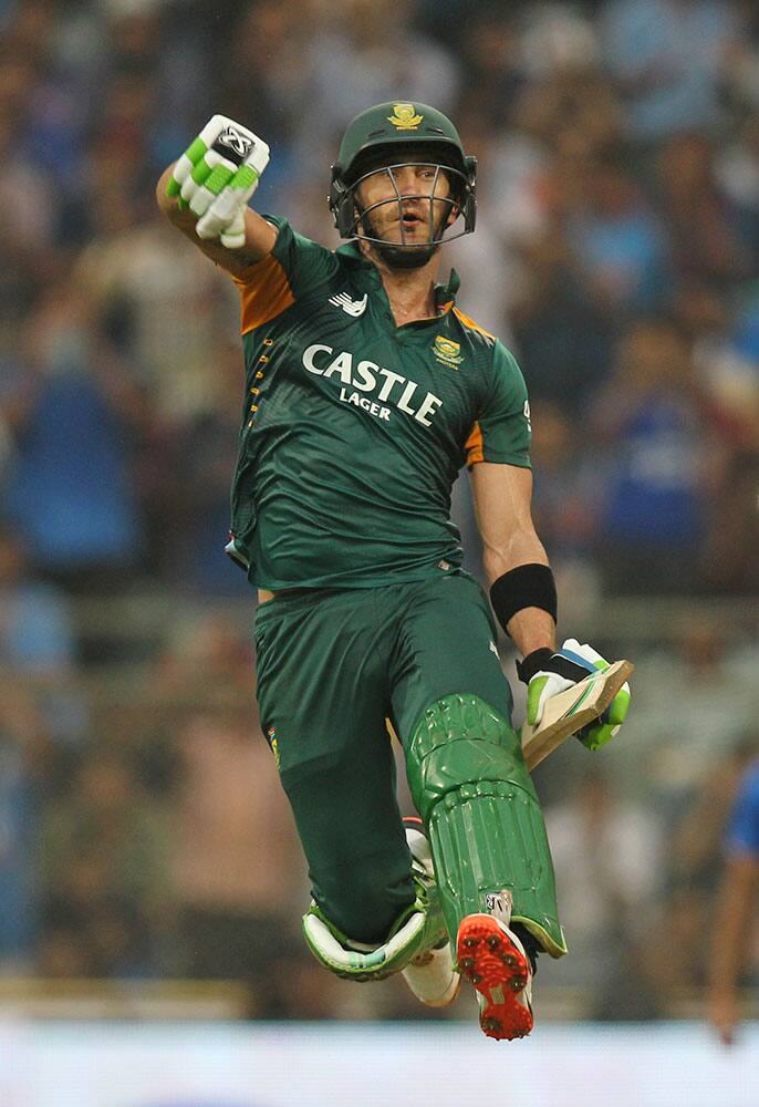 South Africa’s Faf du Plessis celebrates his hundred runs during the final one-day international cricket match of a five-game series against India in Mumbai, India.