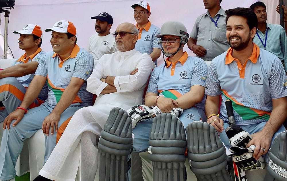 Parliamentarians Anurag Thakur, Kiren Rijiju, Satyavrat Chaturvedi, Sarbananda Sonowal and Rajyavardhan Rathore during a 20-20 cricket match between Parliamentarians and B Town Boys, in New Delhi.