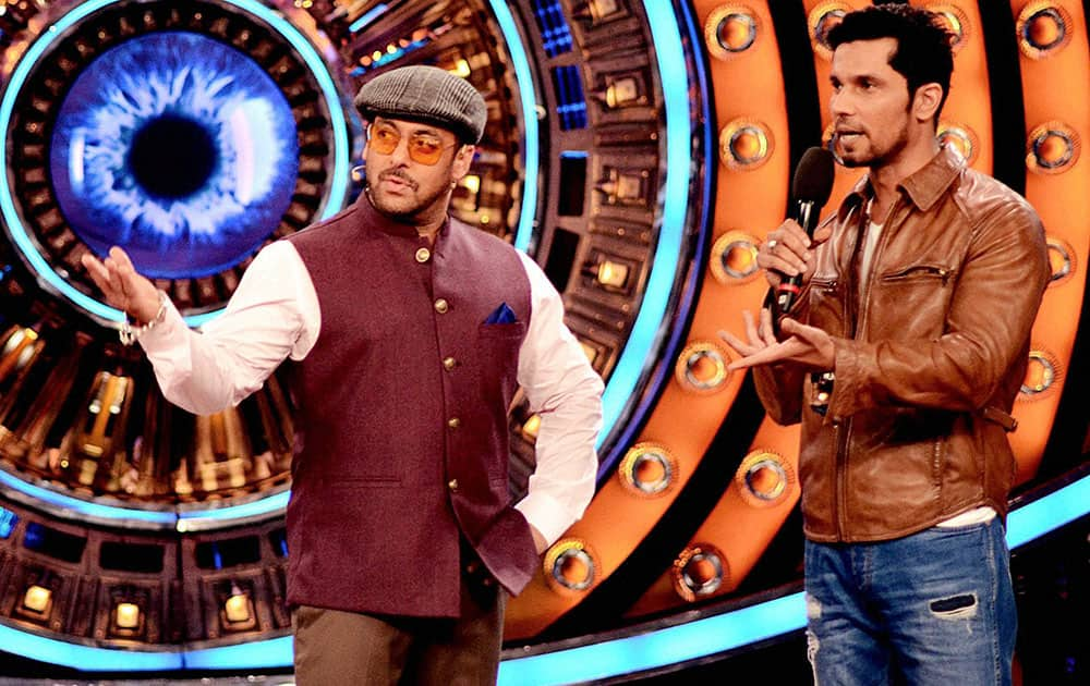 Bollywood actors Salman Khan with Randeep Hooda on the set of Bigg Boss in Mumbai.