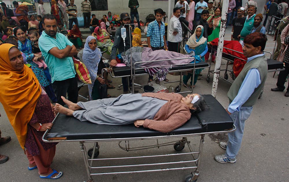 Patients who were shifted outdoors at the government medical college hospital after a strong tremor was felt in Jammu.
