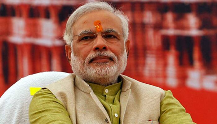 Grand alliance says PM Modi violated poll code, seeks EC action