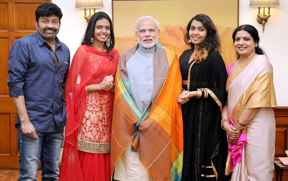 Prime Minister Narendra Modi with Telugu Film Actors Jeevitha and D Rajashekhar in New Delhi.