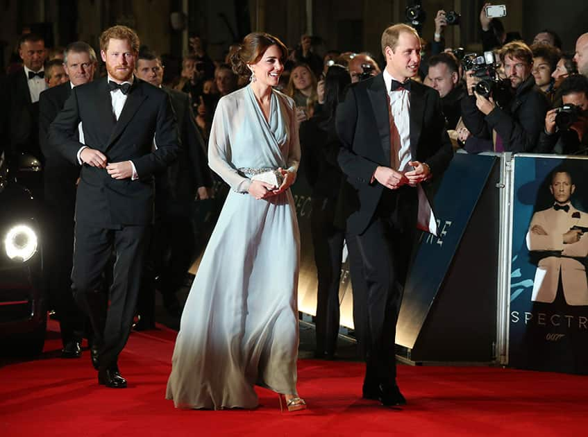 Britain's Prince Harry and the Duchess and Duke of Cambridge arrive for the World Premiere of 'Spectre' at the Royal Albert Hall in central London.