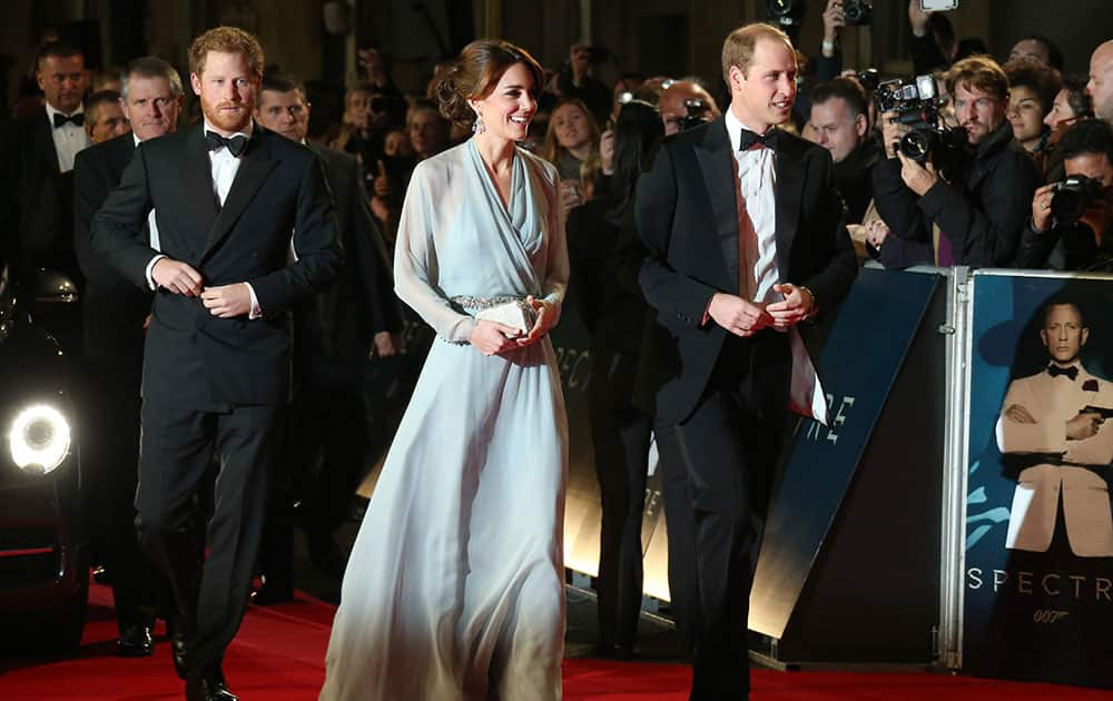 Britain's Prince Harry and the Duchess and Duke of Cambridge arrive for the World Premiere of 'Spectre' at the Royal Albert Hall in central London.