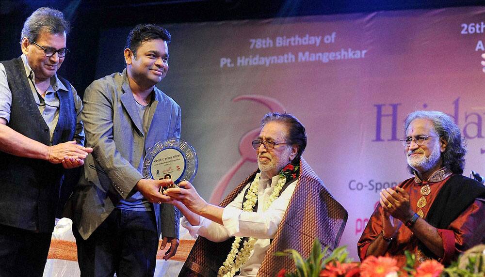 Bollywood filmmaker Subhash Ghai along with Music Composer A R Rahman and Pandit Hridayanath Mangeshkar during the 5th Hridaynath award ceremony in Mumbai.