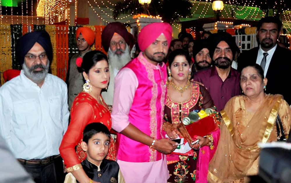 Cricketer Harbhajan Singh, along with family members, at ladies sangeet ahead his marriage with Geeta Basra in Jalandhar.
