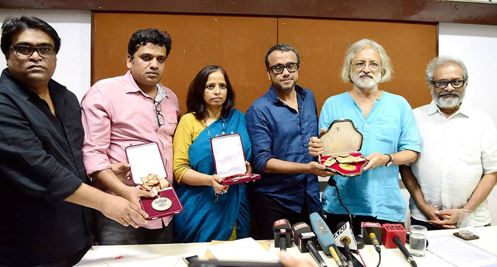 Filmmakers, left to right, Kirti Nakhwa, Harshavardhan Kulkarni, Nishta Jain, Dibakar Banerjee, Anand Patwardhan and Paresh Kamdar at a press conference returning their National Awards in protest against the government over FTII students strike, in Mumbai.
