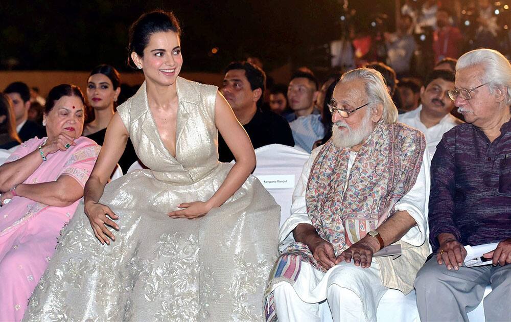 Industrialist Mukesh Ambanis mother Kokilaben Ambani, actress Kangana Ranaut, film maker Adoor Gopalakrishnan during the opening ceremony of 17th edition of Jio MAMI Mumbai Film Festival, in Mumbai.