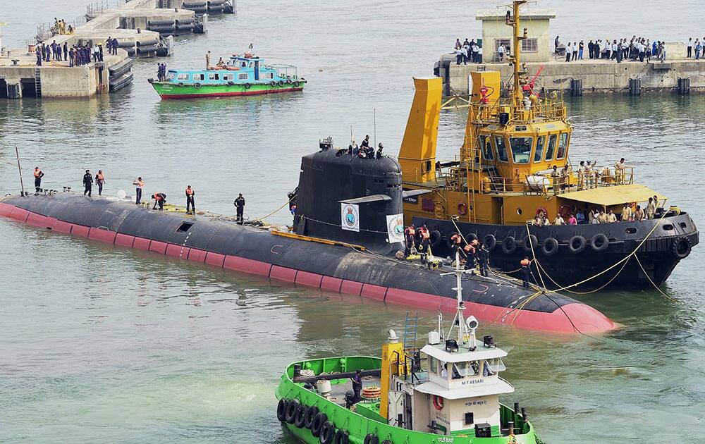 First Scorpene submarine ‘Kalvari’ returns to the Mazagaon Dock in afloat condition in Mumbai.