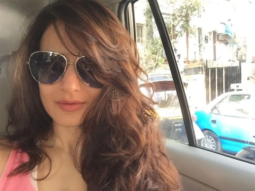 Attempting a selfie of my new haircut in a moving car ... Ufff this bombay traffij. Twitter@ameesha_patel