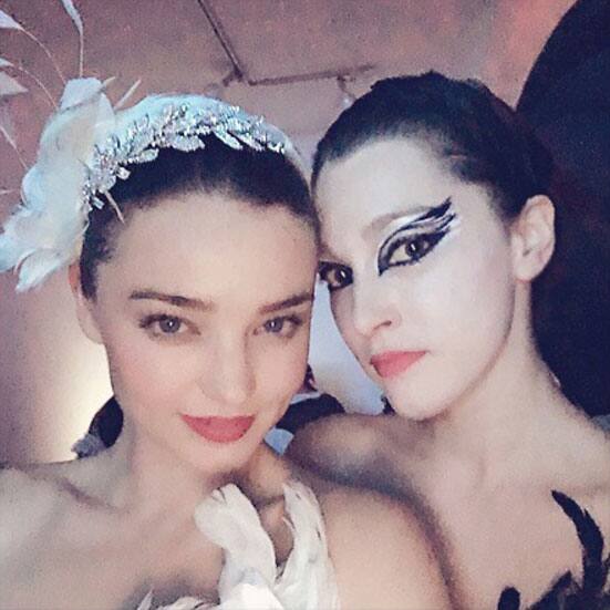 Happy Halloween Thank you @highheelprncess we love you!!! #blackswan #whiteswan Instagram/mirandakerr